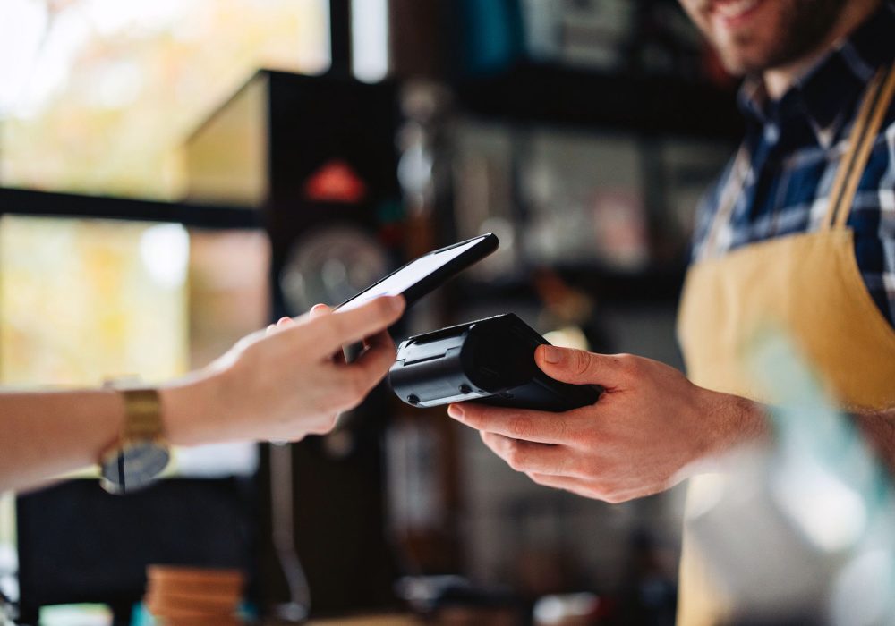 Payment processor switching guide showing merchant considering new contactless payment terminal