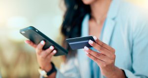 accept phone payments Ireland woman using mobile payment app